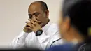 Terdakwa Gulat Medali Emas Manurung menjalani sidang lanjutan di Pengadilan Tipikor Jakarta, Senin (29/12/14). (Liputan6.com/Miftahul Hayat)