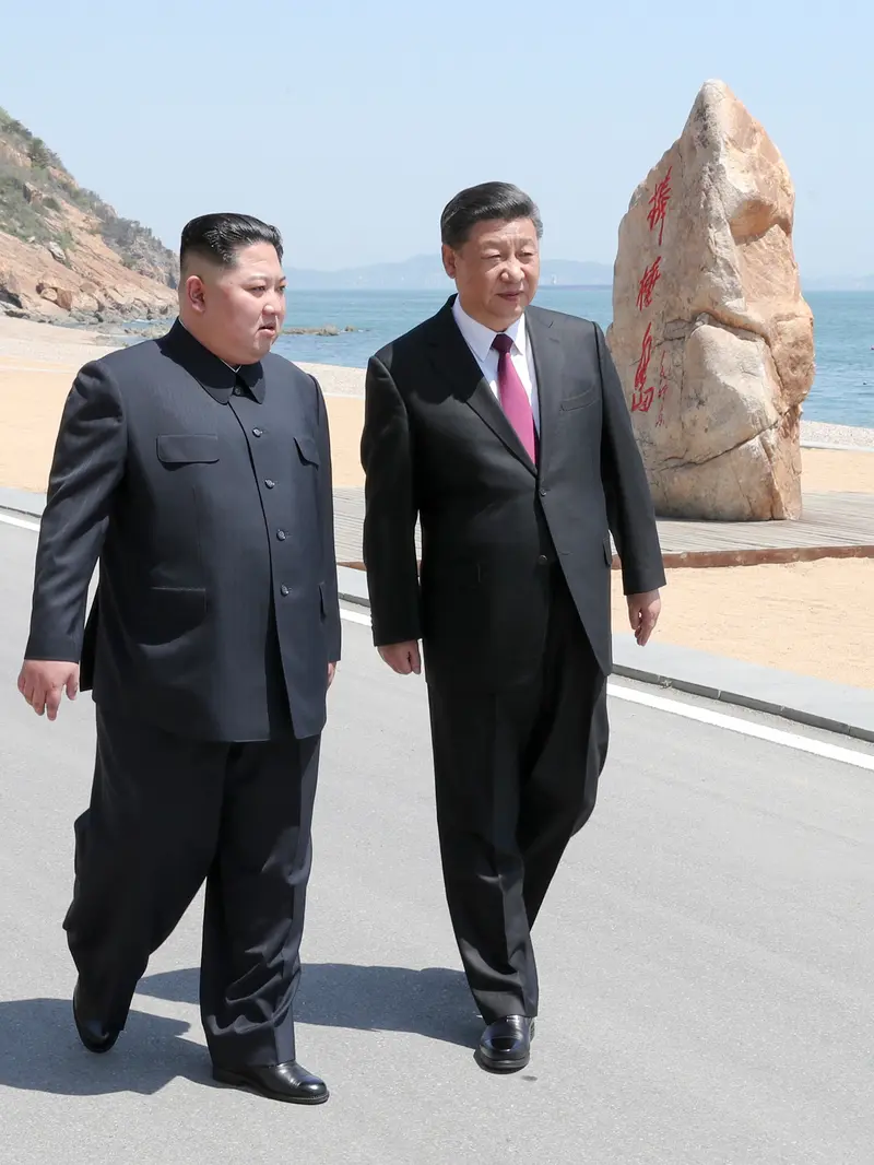 Xi Jinping dan Kim Jong-un