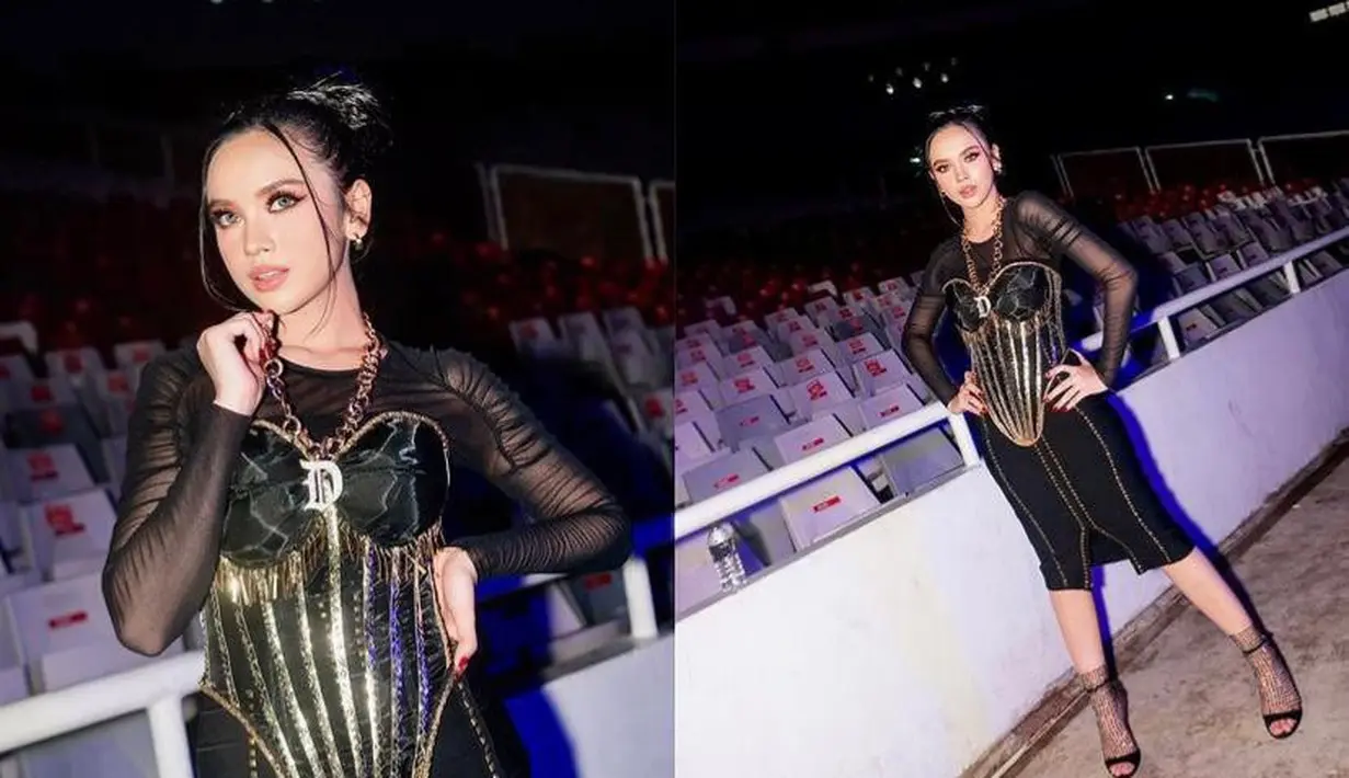 Lyodra Ginting tampil maksimal saat hadir sebagai special guest di konser Dewa 19. Ia tampil bergaya rock and roll mengenakan corset dress dan riasan smokey eye. [Instagram/lyodraginting]
