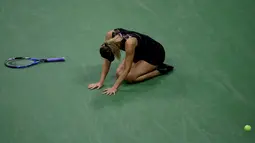 Petenis Rusia, Maria Sharapova usai mengalahkan unggulan kedua Simona Halep dari Rumania pada pertandingan putaran pertama turnamen tenis AS Terbuka di New York, (28/8). Sharapova menang 6-4, 4-6, 6-3. (AP Photo/Julio Cortez)