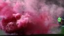 Laga Swindon Town kontra Manchester City pada putaran ketiga Piala FA 2021/22 yang berlangsung di Country Ground diwarnai dengan smoke bomb. Hal tersebut terjadi saat Harry McKirdy mencetak gol pertama dan satu-satunya untuk The Robins. (AFP/Adrian Dennis)