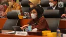 Menteri Keuangan Sri Mulyani saat mengikuti rapat kerja Badan Anggaran DPR RI di Kompleks Parlemen, Senayan, Jakarta, Selasa (31/5/2022). Rapat tersebut beragenda keterangan pemerintah atas KEM PPKF RAPBN 2023 dan RKP Tahun 2023 serta Proyeksi Ekonomi Tahun 2023. (Liputan6.com/Angga Yuniar)
