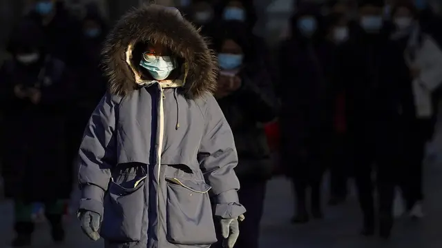 FOTO: China Desak Puluhan Juta Pekerja Migran Tidak Mudik Saat Liburan Imlek