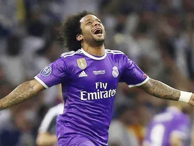 Marcelo - Pemain senior Real Madrid ini mengantongi gaji sebesar 421.000 euro atau sekitar Rp 6,8 miliar setiap minggunya. Selama berseragam Los Blancos Marcelo telah menahbiskankan dirinya sebagai salah satu bek kiri terbaik di dunia. (AP/Dave Thompson)
