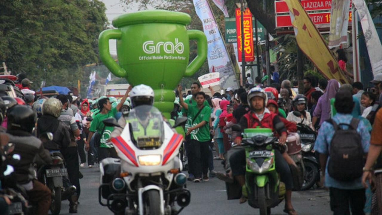 Antusias Warga Kota Malang Sambut Pawai Api Obor Asian Games 2018