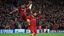 Pemain Liverpool, Mohamed Salah usai mencetak gol ke gawang AS Roma pada leg pertama semifinal Liga Champions di Stadion Anfield, Liverpool, Inggris, Selasa (24/4). Salah mencetak dua gol dalam pertandingan tersebut. (Peter Byrne/PA via AP)