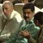 Fidel Castro duduk di samping Presiden Venezuela sekutu Kuba di perayaan 90 tahun Fidel. (Reuters)