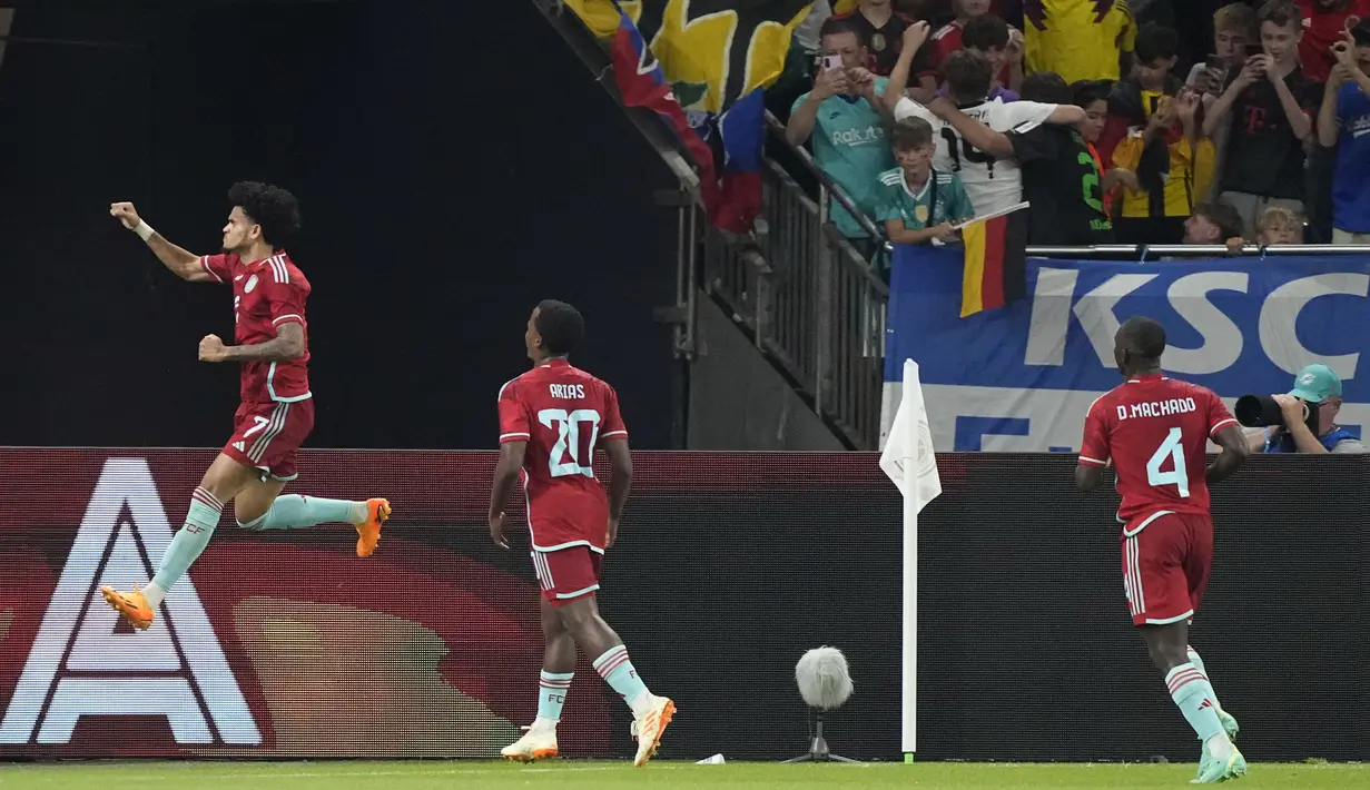 Gol masing-masing dicetak oleh Luis Diaz dan eksekusi penalti Juan Cuadrado.  (AP Photo/Martin Meissner)