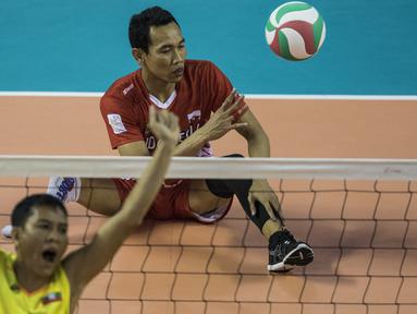 Pevoli Indonesia, Tatag Sugiyono, tampak kecewa dikalahkan Myanmar pada laga Asian Para Games di Tenis Indoor Senayan, Jakarta, Minggu (7/10/2018). Indonesia kalah 0-3 dari Myanmar. (Bola.com/Vitalis Yogi Trisna)