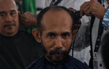 FOTO: Antusiasme Masyarakat Surabaya Ikut Potong Rambut Massal Menyambut Ramadan