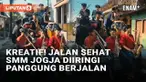 Event jalan sehat umumnya diwarnai hiburan panggung di titik start dan finish. Namun cara unik dilakukan panitia jalan sehat yang digelar Sekolah Menengah Musik (SMM) Yogyakarta. Sesuai dengan fokus studi di SMM, panitia membawa hiburan musik di sepa...
