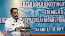 Kepala BNN, Budi Waseso memberikan sambutan saat penandatanganan Nota Kesepahaman di Kantor BNN, Cawang, Jakarta, Senin (8/5). Buwas berharap upaya kedua pihak dapat mempengaruhi sikap positif dan kinerja yang lebih produktif. (Liputan6.com/Yoppy Renato)