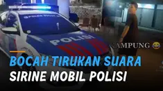 Meski malu-malu, sang bocah mengeluarkan suara sirine dari mulutnya.