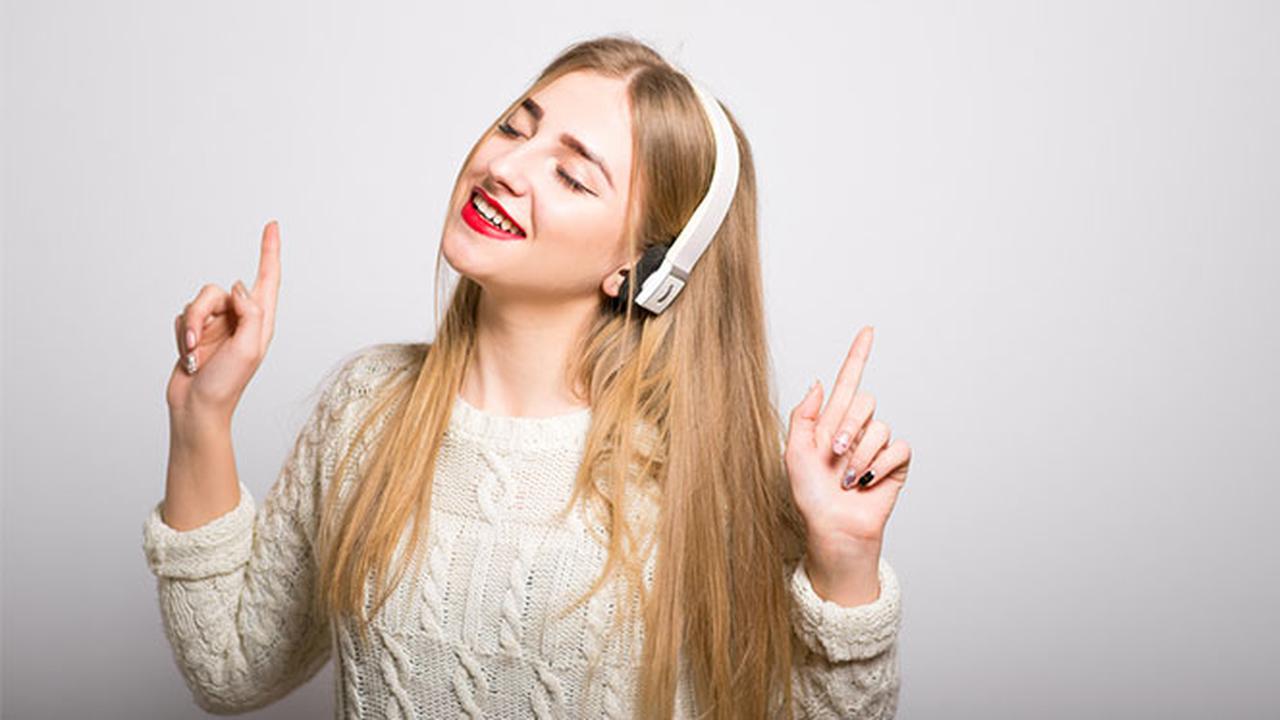 Woman with headphone bluetooth