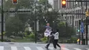 Topan Bebinca menerjang kota Shanghai sekitar pukul 07.30 waktu setempat dengan kecepatan angin mencapai 42 meter per detik. (Hector RETAMAL/AFP)