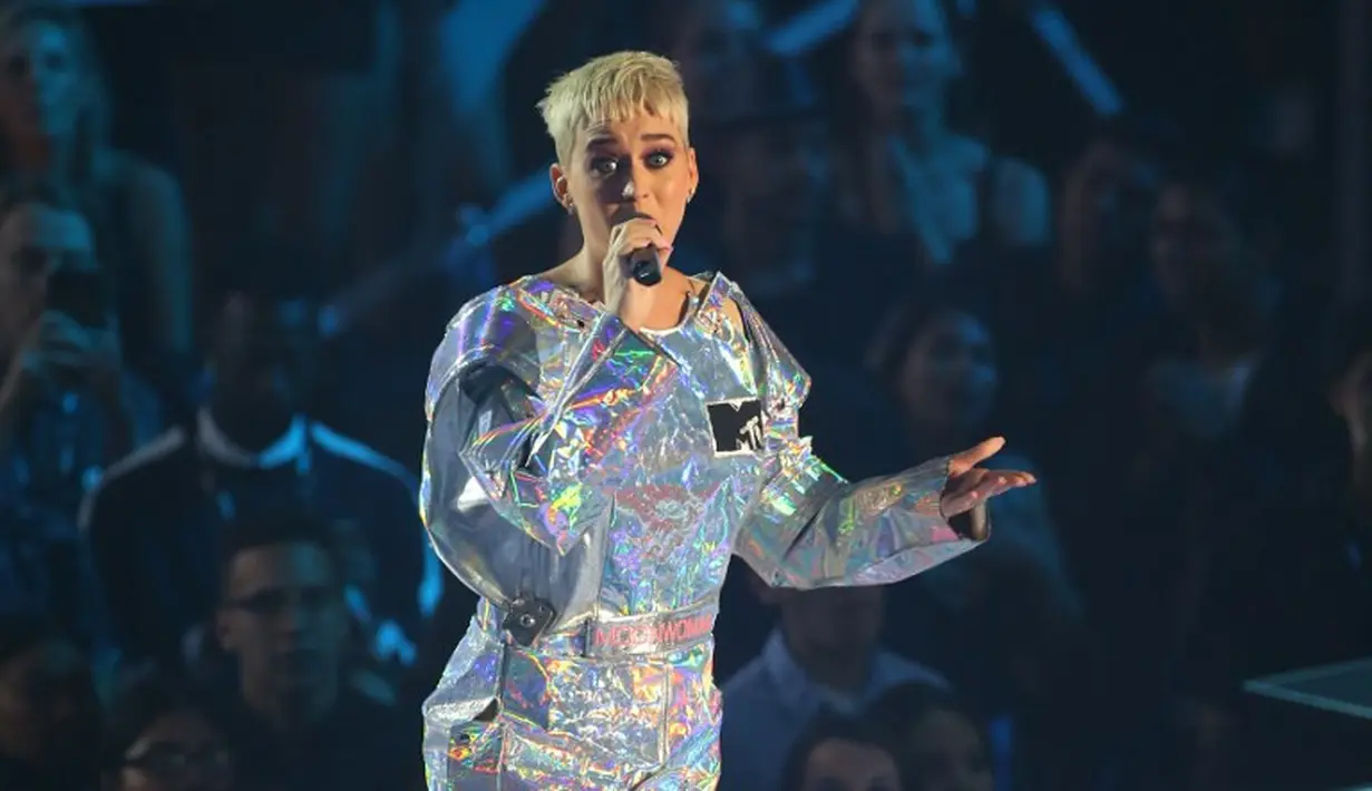 Katy Perry adalah nama unik dan mudah diingat. Namun nama asli musisi cantik ini adalah Katheryn Elizabeth Hudson. (JEAN-BAPTISTE LACROIX / AFP)