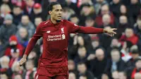 5. Virgil van Dijk (Liverpool) - Benteng tangguh The Reds ini menjadi satu di antara aktor utama keberhasilan Liverpool musim lalu. Bek timnas Belanda itu kemungkinan mendapatkan nilai 91 di FIFA 20. (AP/Rui Vieira)