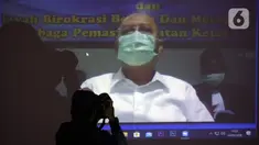 Wali Kota nonaktif Medan Tengku Dzulmi Eldin menjalani sidang pembacaan tuntutan secara video conference di Gedung KPK, Jakarta, Kamis (14/5/2020). Tengku Dzulmi Eldin terlibat dalam kasus dugaan menerima suap proyek dan jabatan pada Pemkot Medan tahun 2019. (merdeka.com/Dwi Narwoko)