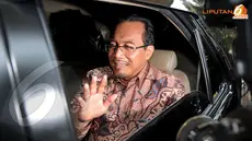 Menteri Pertanian Suswono langsung naik ke dalam mobil dan meninggalkan gedung KPK (Liputan6.com/Helmi Fithriansyah)
