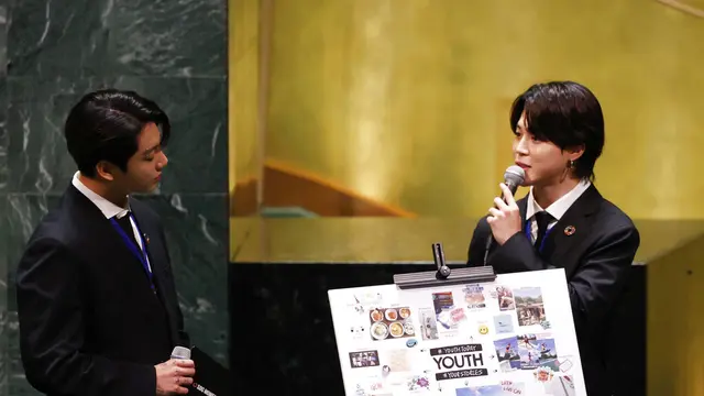 Jungkook dan Jimin dalam Sidang Umum PBB 2021. (John Angelillo/Pool Photo via AP)