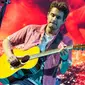 Menjalani gaya hidup sehat memang bukan hal mudah, terlebih bagi mereka yang sudah terbiasa mengonsumsi minuman beralkohol. Tak heran jika John Mayer meras bangga lantaran bisa mengatasi itu. (AFP/Suzane Cordeiro)