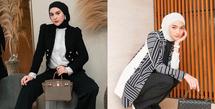 Ciptakan tampilan lady boss dengan padanan celana hitam, blazer dan kemeja ala Irish Bella. [Foto: IG/_irishbella_].