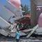 Seorang pria berjalan melewati masjid yang runtuh akibat gempa, di Lamba Leda, provinsi Nusa Tenggara Timur, Indonesia, Selasa, 18 Agustus 2026. (AP Photo/Firdia Lisnawati)