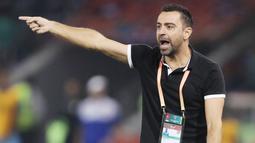 Xavi Hernandez - Legenda Barcelona ini sudah sejak lama diinginkan manajemen Blaugrana untuk mengisi kursi pelatih. Sejauh ini, prestasi Xavi sebagai pelatih juga cukup mentereng yakni dengan mempersembahkan empat trofi untuk Al Sadd. (AFP/Karim Jaafar)