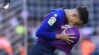 Gelandang Barcelona, Philippe Coutinho, merayakan gol yang dicetaknya ke gawang Real Madrid pada laga La Liga Spanyol di Stadion Camp Nou, Barcelona, Minggu (28/10). Barcelona menang 5-1 atas Madrid. (AFP/Gabriel Bouys)