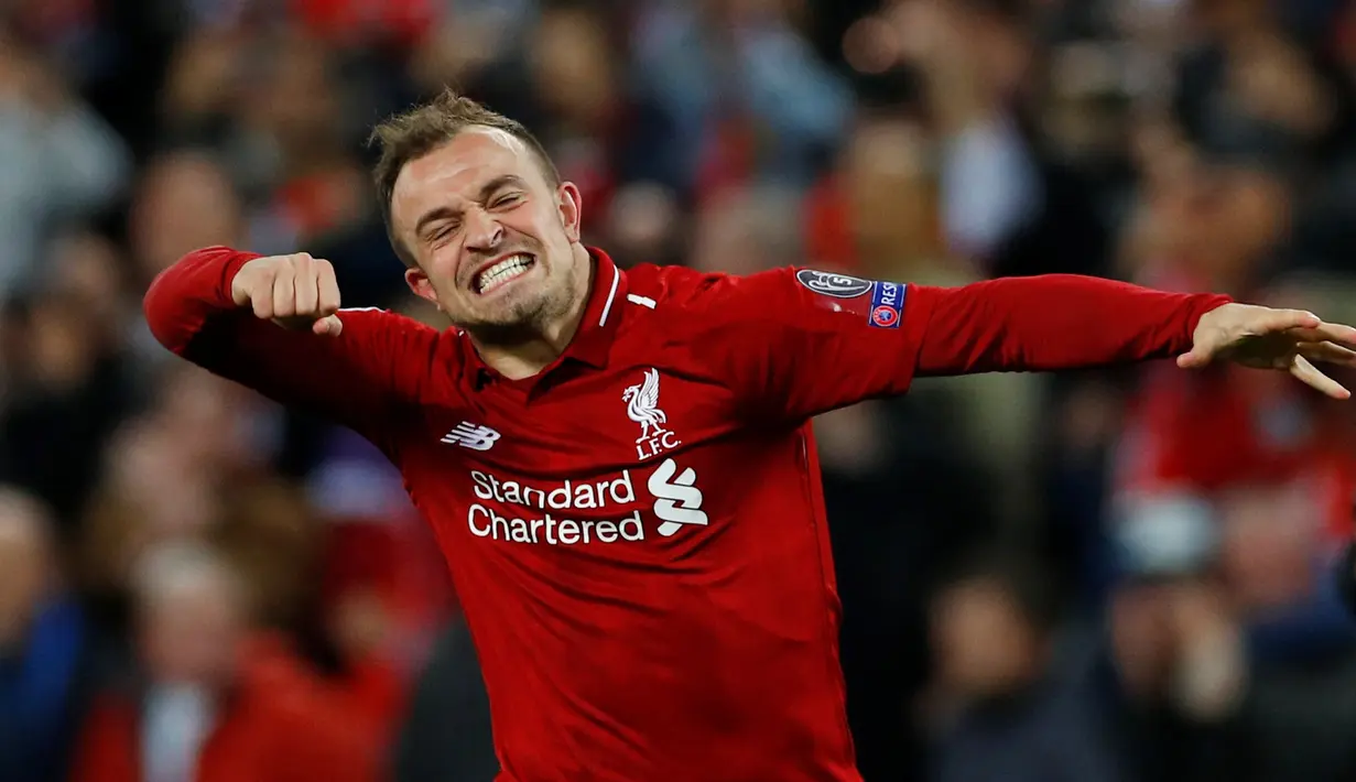 Penyerang Liverpool Xherdan Shaqiri berselebrasi usai pertandingan melawan Barcelona di Stadion Anfield, Liverpool, Inggris, 7 Mei 2019. Pemain asal Swiss ini akan membela Liverpool menghadapi Tottenham Hotspur di final Liga Champions 2019. (REUTERS/Phil Noble)