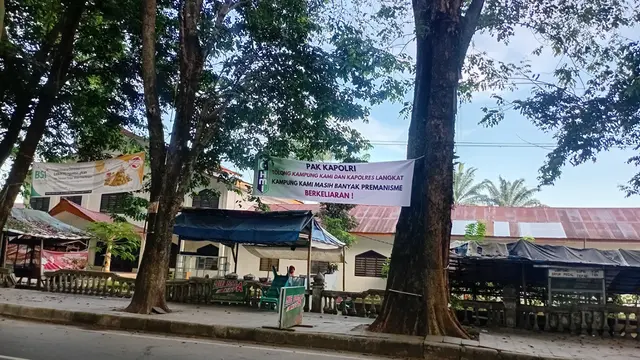 Spanduk berisi keresahan aksi premanisme di Langkat (Istimewa)