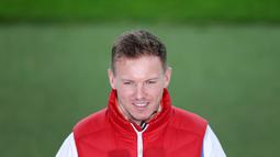 Pemecah Rekor - Julian Nagelsmann berhasil memecahkan rekor pelatih termuda dalam sejarah Bundesliga. Saat itu Nagelsmann baru berusia 28 tahun ketika ia ditunjuk sebagai pelatih kepala Hoffenheim pada Februari 2016. (AFP/Ronny Hartmann)