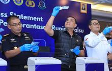 FOTO: Bareskrim dan Bank Indonesia Musnahkan Ratusan Ribu Lembar Uang Palsu