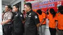 Tersangka anggota Dewan Perwakilan Rakyat Daerah Tabanan Bali dihadirkan saat rilis di Polda Metro Jaya, Jakarta, Kamis (15/6). Direktorat Reserse Narkoba Polda Metro Jaya tangkap anggota DPRD Tabanan Bali terkait narkoba. (Liputan6.com/Yoppy Renato)