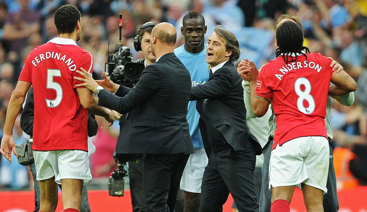 Kolaborasi keduanya menghasilkan dua gelar bagi Manchester City. Piala FA menjadi yang pertama diraih pada akhir musim 2010/2011 dan dilanjutkan dengan gelar kedua di musim berikutnya yaitu juara Premier League 2011/2012. (AFP/Carl De Souza)