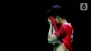 Pebulu tangkis tunggal putra Indonesia, Anthony Sinisuka Ginting saat bertanding melawan Viktor Axelsen (Denmark) pada Semifinal Indonesia Masters 2022 di Istora Senayan, Jakarta, Sabtu (11/6/2022). Anthony Sinisuka Ginting gagal melaju ke final Indonesia Masters 2022. (Liputan6.com/Helmi Fithriansyah)