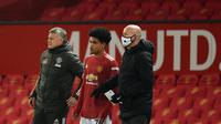 Shola Shoretire membuat sejarah bersama Manchester United pada leg kedua babak 32 besar Liga Europa kontra Real Sociedad. (OLI SCARFF / POOL / AFP)