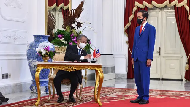 FOTO: Jokowi Terima Kunjungan PM Malaysia di Istana Merdeka