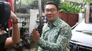 Gubernur Jawa Barat Ridwan Kamil usai mengunjungi kediaman calon wakil presiden nomor urut 01 Ma'ruf Amin di Jalan Situbondo, Menteng, Jakarta Pusat, Selasa (12/2). (Liputan6.com/Immanuel Antonius)