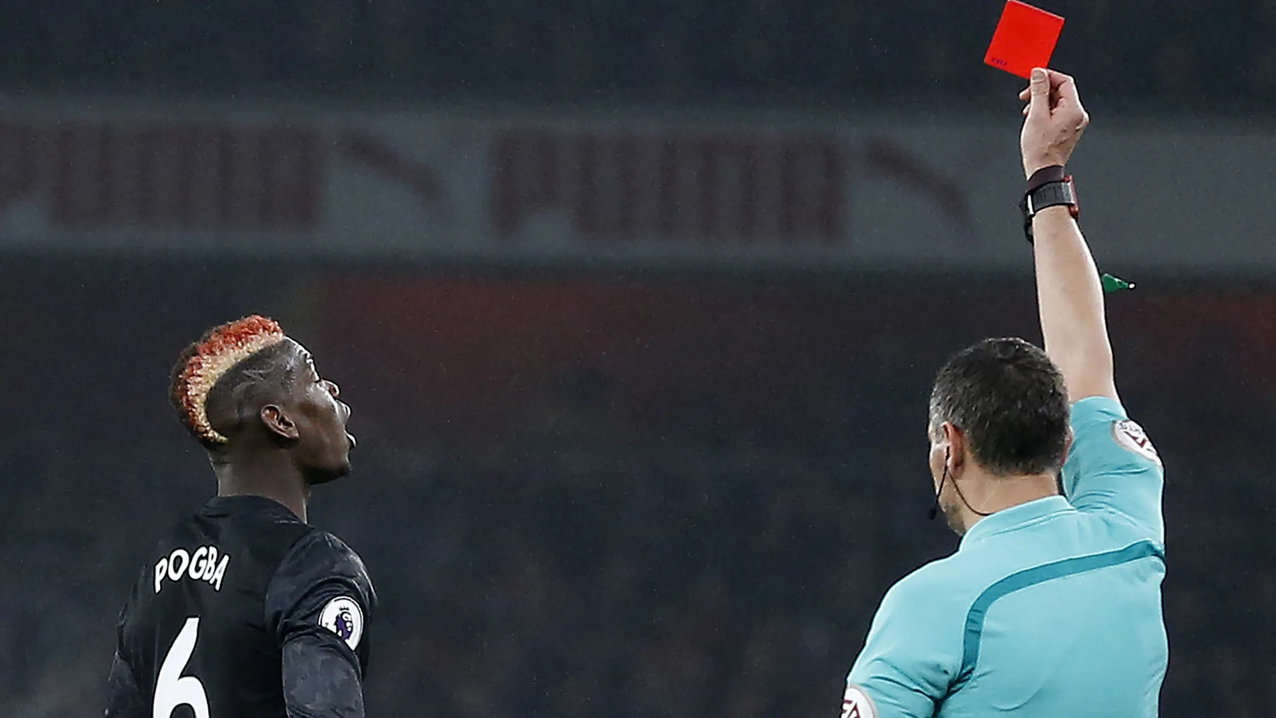 Paul Pogba absen di derby Manchester.
