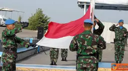 Citizen6, Kongo: Pengibaran bendera merah putih di di Lapangan Parade Soekarno, Lebanon Selatan, Senin pagi (18/4) waktu Lebanon. (Pengirim: Badarudin Bakri Badar)
