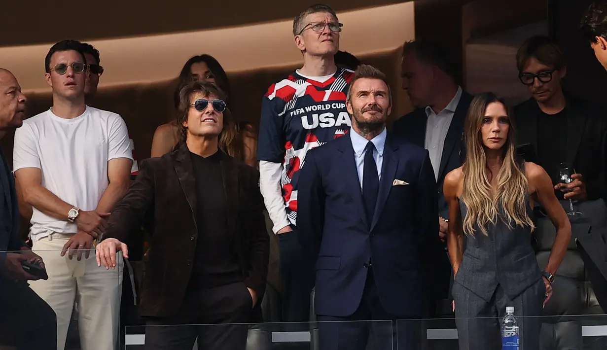 Pertandingan pembuka Grup D di Piala Dunia 2026 antara Amerika Serikat melawan Paraguay dihadiri mantan pesepak bola Inggris, David Beckham dan aktor Amerika Serikat, Tom Cruise. (AFP/Getty Images/Stu Forster)