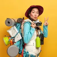 ilustrasi traveling/photo created by wayhomestudio - www.freepik.com