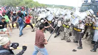 Bentrokan antara warga dan aparat keamanan terjadi di Pulau Rempang. (Liputan6.com/ Dok Ist)