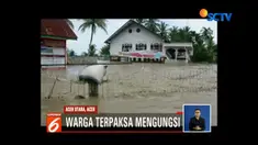 Sungai Krueng Pase meluap akibatnya tanggul jebol dan memicu terjadinya banjir yang merendam enam kecamatan.