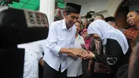 Jokowi dan Khofifah Indar Parawansa (Liputan6.com/Herman Zakharia)
