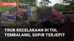 Kecelakaan terjadi di jalur penyelamat Tol Tembalang pada turunan Tanjakan Tembalang. Sopir dan kenek truk terjepit di dalam kendaraan, menunggu proses penyelamatan