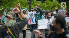 Massa yang tergabung dalam Ikatan Mahasiswa Papua menggelar unjuk rasa di depan Kementerian Dalam Negeri, Jakarta, Rabu (24/2/2021). Dalam aksinya mereka mengutuk tindakan elite politik Papua yang mengatasnamakan rakyat Papua untuk mendukung Otonomi Khusus (Otsus). (Liputan6.com/Faizal Fanani)