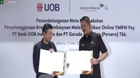 Penandatanganan MoU penyelenggaraan kredit pembiayaan melalui aplikasi online TMRW Pay Bank UOB Indonesia dan PT Garuda Indonesia Tbk (GIAA), Rabu (11/5/2022 (Liputan6.com/Gagas Y.G)