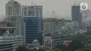 Lanskap gedung pencakar langit diambil dari kawasan Jakarta Pusat, Senin (26/9/2022). Berdasarkan situs IQAir, Jakarta beberapa kali meraih jawara Indeks kualitas udara (Air Quality Index/ AQI) terburuk dunia. (Liputan6.com/Johan Tallo)